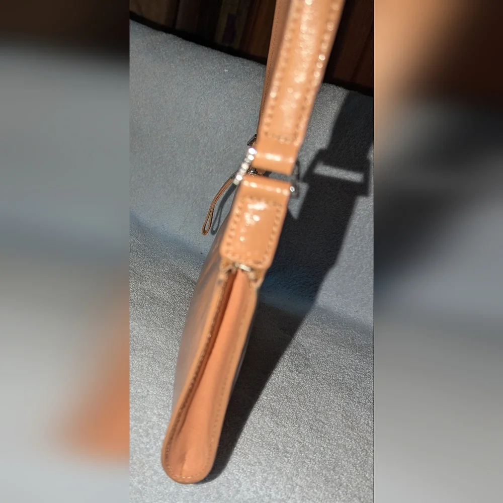 Monsac tan leather bag.